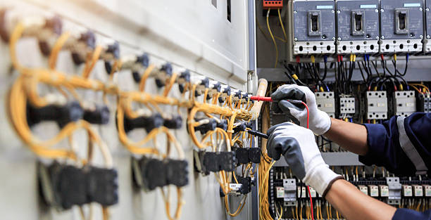 Professional Electrician technician working in Russellville, AR